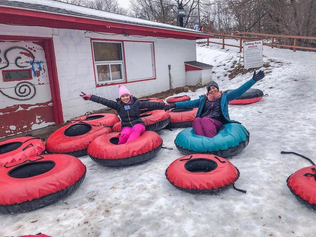 Photo by user discover_kzoosports, caption reads This week's #FacilityFriday is Echo Valley and it includes some of our favorite winter activities in Kalamazoo. Tubing, tobogganing, skating... There's something for everyone! ❄️🛷⛸⁠⠀
⁠⠀
For other ways to enjoy winter check out our Winter (269) Guide 😍👆 Link in bio!⁠⠀
⁠⠀
#discoverkzoo #puremichigan #kalamazoo #michigan