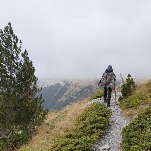 Photo by dannasvan, caption reads: After a grueling 10 hour hike up Mount Olympus, we made it as far as we could before the wrath of Zeus in the form of heavy clouds and strong winds forced us to turn back.
We were disappointed we didn't reach the Mytikas peak, but the views, the nature and all the amazing people we met on the way more than made up for it.
This won't be the last time this mountain sees us, we will be back for round 2 (ideally not in November!) to conquer the highest peak. 
#MountOlympus #greece #mytikas #zeus #europe #europetravel #europebyvan #europevantrip #vantrip #vanlife #vantravel #nissannv200camper #hiking #climbing #naturephotography #homeiswhereyouparkit