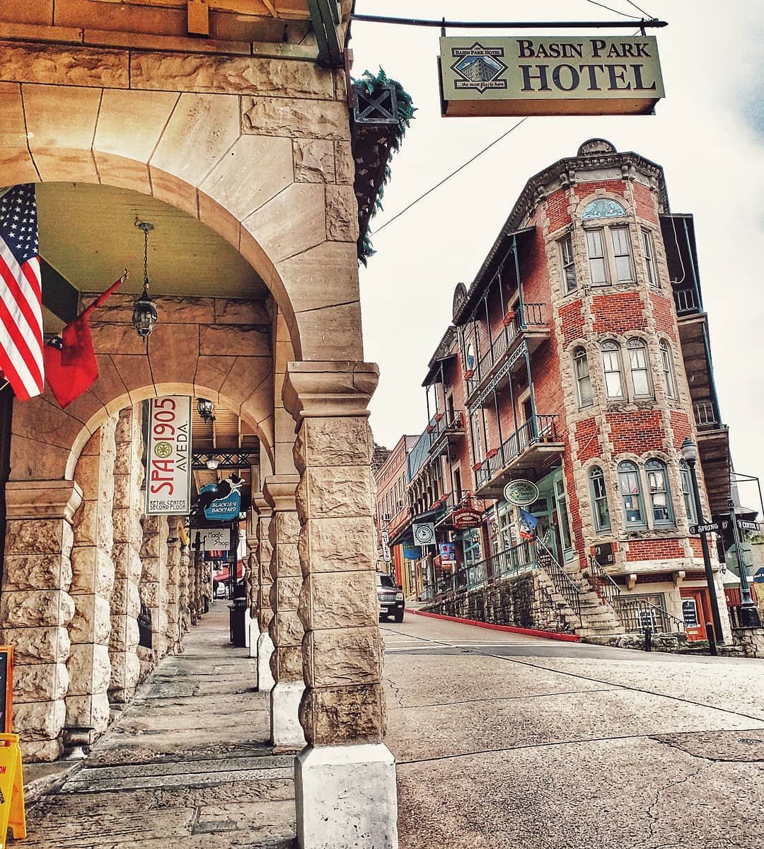 Photo by user rosehunting, caption reads Eureka Sptings and its beautiful downtown. It must have been too early in the morning though. 😊
.
.
.
.
.
#repost #enjoyarkansas #eurekasprings #arkansas #AR #buliding #architecture #architect #ilovearchitecture #basinparkhotel #downtowneurekasprings
 #streetphotography #streetphoto #ig_northamerica
 #ig_unitedstates #lonelyplanet #traveldeeper  #tlpicks #afarmag #delta #travel #travelphotography #explore #wanderlust #explorer #adventure #travelbug #worldmobilephotography
#mobilephotography #withgalaxy