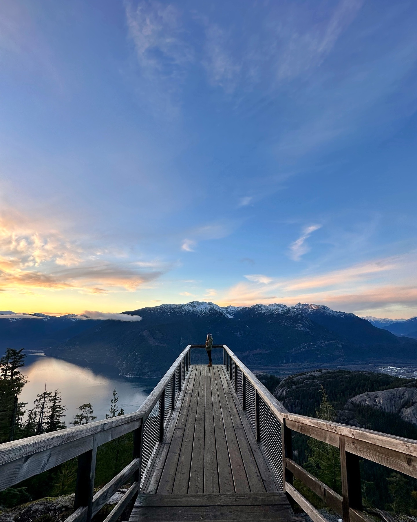 photo by pnw_past caption reads: Taking in the views 

seatoskygondola tourismsquamish 

.
.
.
.

#pacificnorthwest #pnw #pnwpast #pnwlife #pnwcollective #pnwphotographer #pnwhiking #pnwwonderland #pacific #westcoast #westcoasttrail  #love #beautifulbc #explorebc #tourismbc #travelbc #beautifulbritishcolumbia #discoverbc #vancouver #seatosky #seatoskygondola #seatoskyhighway #squamish #squamishbc #howesound #ocean #pacificocean #winter #oceanview #mountains