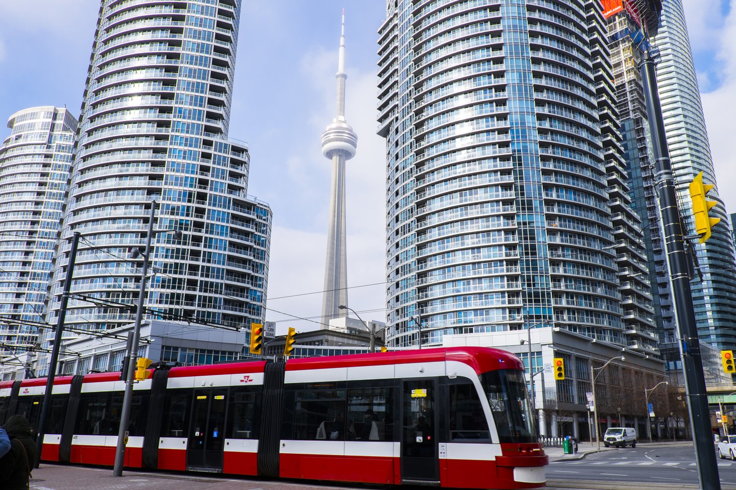 Downtown Toronto with CN Tower in background and streetcar in forefront