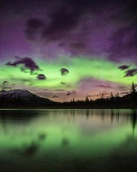 Photo by devinshots, caption reads: Aurora Borealis reflected on the Athabasca River. Gotta say I’m having fun with the late night/early morning Aurora chasing. Such an incredible thing to see and photograph. 
• Aurora Borealis from the Athabasca River, near Mt. Greenock, Jasper NP
.
.
.

.
.
.
#auroraborealisphotography #auroraborealis  #northernlights #northernlightsphotos #auroraboreal #aurorahunting #auroraphotography #longexposure_shot #nightphotography #myjasper #venturebeyond #tourismjasper #adventurehere #jasperdarksky #jaspernationalpark #jasperalberta #wanderlustalberta 
#explorealberta #travelalberta #albertacanada #discoveralberta #livelovecanada #explorecanada #canada_photolovers #parkscanada #idadarksky