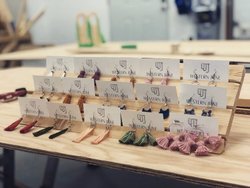 Photo by western_june, caption reads: Earring set up is ready for the up and coming ferniecraftfairs this weekend! November 22-23 ❄️🏔️🧵 .
.
.
#earrings #westernjune #kootenays #cranbrookbc #kimberleybc #ferniestoke #fernieart #bcartist #fernie #tasselearrings #eastkootenays #supportlocal #localart #handmade #nicklefreemetal #patternanddesign #earringdesign #textilearts #kootenayartist #kootenaybabe