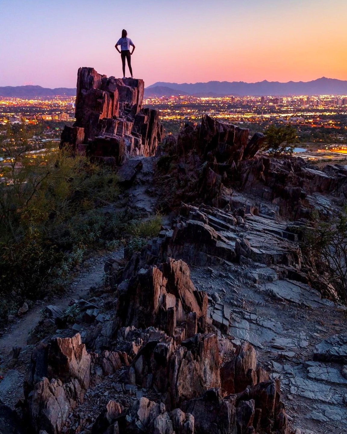 Photo by user chirag5patel, caption reads My daughter overlooking the city at dusk.
.
.
In frame: mayapastel .
.
.

#artofvisuals #explorearizona #arizonaisgorgeous #depthsofearth #moodygrams #hikevibes #hikingbangers #visitarizona #roamtheplanet #majestic_earth #instagood #earthfocus #nature #beautifuldestinations #outdooradventures #adventurenthusiasts #natgeoyourshot #indianphotographers #canonusa #hiking #see_arizona #amongthewild #iloveaz #wildernessnation #arizona #ig_arizona #capturearizona #instagramaz #phoenix #visitphoenix .
.
.
travel.to.usa 
hikearizona
westbysouthwest
azfamily
abc15arizona
12newsaz
fox10phoenix
welcometoarizona
see_arizona
arizonaisgorgeous
arizonaroamers
conquerarizona
capturearizona
visitarizona
hikingbangers
wildernessnation
visitphoenix 
lobo_mountain
merknmountains
explorearizona_