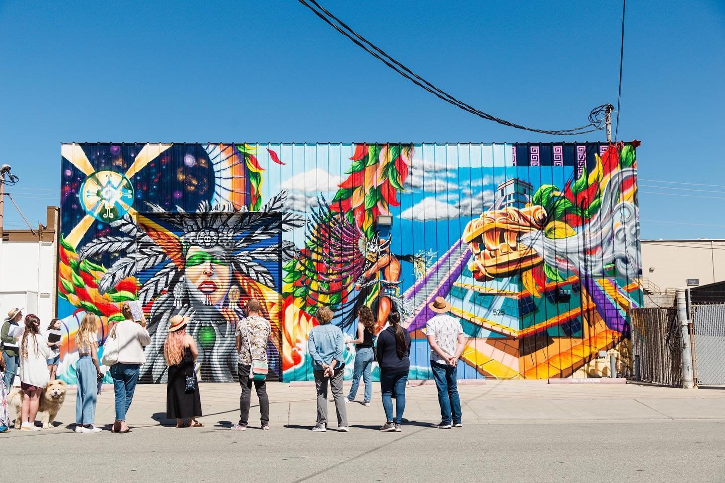 Photo by user seemonterey, caption reads Roam the streets of Sand City and take in all of the vibrant murals on display. 

Find "La Neta" on the corner of Ortiz and Contra Costa, and continue your walking tour to see all of the amazing murals created this year.  #SeeMonterey

Photo by @youthartscollective
🎨 @la.neta.murals  @abacaart @naticorazza @artdesevilla @gi.zambrano @avelsanher 
📍 Sand City

#montereyartists #supportlocalart #supportlocalartists