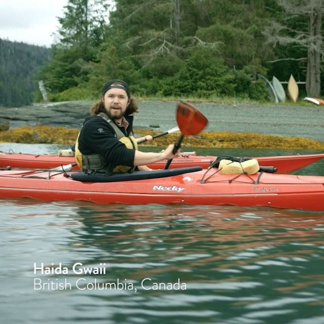 photo by Destination British Columbia caption reads: Kye Borserio of Kitgoro Kayaking shares his love of Haida Gwaii—a remote collection of 150+ islands on BC's North Coast. #exploreBC #exploreCanada #travelnorthernbc #gohaidagwaii